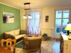 Villa Margot Whg. 08 - Wohnzimmer mit Zugang zum Balkon