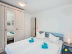 Ferienwohnung Sellin 07 - Schlafzimmer mit Doppelbett