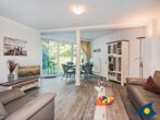 Ferienwohnung Sellin 07 - Wohnzimmer mit Zugang zur Terrasse