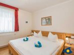 Villa Strandperle, Whg. 13 - Schlafzimmer mit Doppelbett