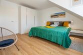Strandhus Ritzi - Schlafzimmer mit Doppelbett