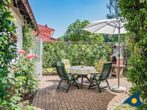 Ferienhaus Eichelhäher - Terrasse mit Sitzmöglichkeit