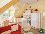 Dünen-Residenz C 19 / - Wohnzimmer mit Essbereich und Küchenzeile