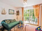 Villa Strandperle, Whg. 07 - Wohnzimmer mit Zugang zum Balkon