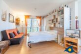 Villa Strandperle, Whg. 07 - Wohnbereich mit ausklappbarem Schrankbett, Balkon, Küche und Sitzecke