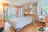 Villa Strandperle, Whg. 07 - Wohnbereich mit ausklappbarem Schrankbett, Balkon, Küche und Sitzecke