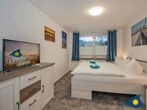 Ferienhaus Buntspecht - Schlafzimmer 1 mit Doppelbett