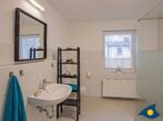 Ferienhaus Buntspecht - Badezimmer mit Dusche und WC