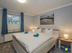 Ferienhaus Buntspecht - Schlafzimmer 2 mit Doppelbett und Schlafcouch