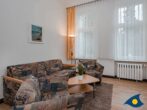 Villa Fichtenhain Whg. 02 - Wohnzimmer mit Schlafcouch und Essecke