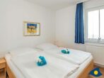 Villa Strandperle, Whg. 25 - Schlafzimmer mit Doppelbett