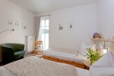 Residenz Sonnenhof Whg. 31 - Sonnenbalkon trifft Ostseeluft - Schlafzimmer mit zwei Einzelbetten