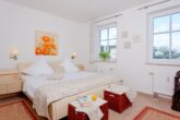 Residenz Sonnenhof Whg. 31 - Sonnenbalkon trifft Ostseeluft - Schlafzimmer mit Doppelbett