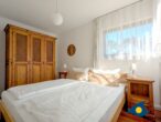Villa Marlen App. 01 - Küstenflair trifft Wohnkomfort - Schlafzimmer mit Doppelbett