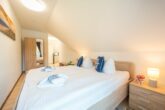 Ferienwohnung Hügelblick 07 - Schlafzimmer mit Doppelbett