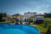 Ferienwohnung Hügelblick 07 - Außenansicht mit Pool