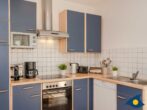 4-Sterne-Ferienhaus Anima mit Sauna, Kamin und Badeteich - Küche mit Herd