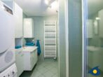 Ferienhaus Melle 02 - Badezimmer mit Dusche und WC im EG