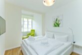 Villa Livia Whg. 02 /- - Schlafzimmer 1 mit Doppelbett