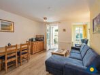 Villa Margot Whg. 23 ///- - Wohnzimmer mit Essbereich und Zugang zum Balkon