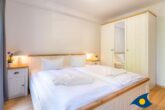 Villa Strandperle, Whg. 18 - Schlafzimmer mit Zugang zum Balkon
