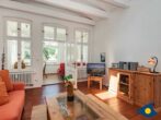 Villa Waldblick Whg. 08 - Wohnzimmer mit Zugang zur Verranda und Terrasse
