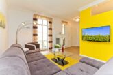 Villa Livia Whg. 01 /- - Wohnzimmer mit Zugang zum Balkon