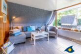 Reetdachhaus Ostseeglück im Birkenhain - Wohnbereich mit Schlafcouch