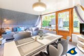 Reetdachhaus Ostseeglück im Birkenhain - Wohnbereich mit Schlafcouch