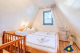 Reetdachhaus Ostseeglück im Birkenhain - Schlafbereich oben mit Doppelbett