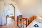Reetdachhaus Ostseeglück im Birkenhain - Schlafbereich oben mit Doppelbett