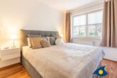 Fräulein Loddin Whg. Willi - Schlafzimmer mit Doppelbett